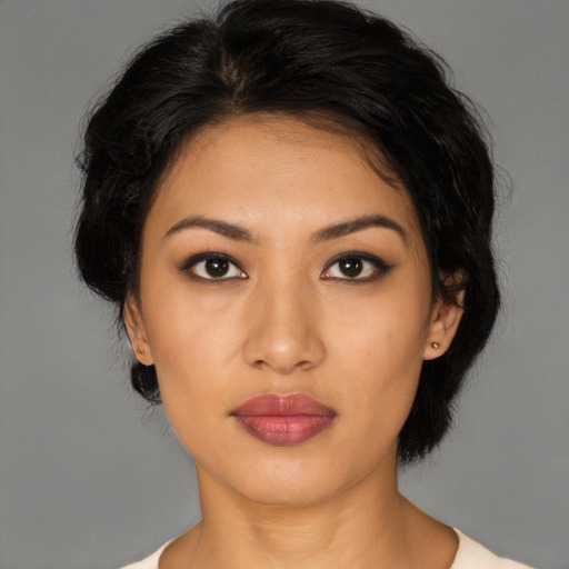 Neutral latino young-adult female with medium  black hair and brown eyes
