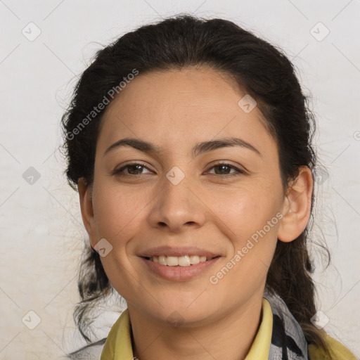 Joyful latino young-adult female with medium  brown hair and brown eyes