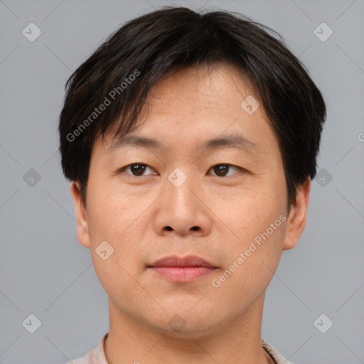 Neutral asian young-adult male with short  brown hair and brown eyes