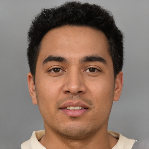Neutral latino young-adult male with short  black hair and brown eyes