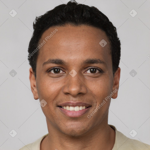 Joyful black young-adult male with short  black hair and brown eyes