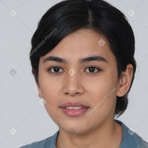 Joyful asian young-adult female with medium  black hair and brown eyes