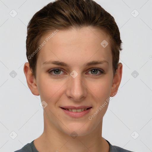 Joyful white young-adult female with short  brown hair and grey eyes