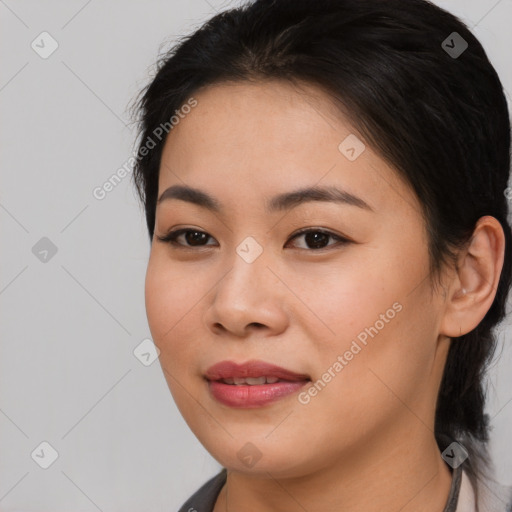 Joyful asian young-adult female with medium  brown hair and brown eyes