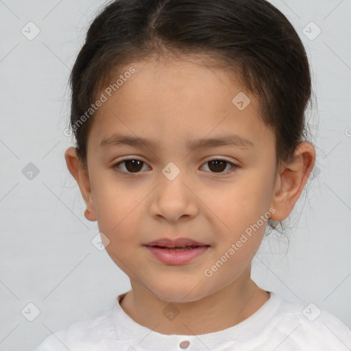 Joyful white child female with short  brown hair and brown eyes