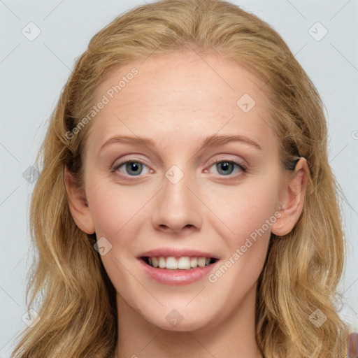 Joyful white young-adult female with long  brown hair and blue eyes