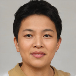 Joyful asian young-adult female with short  brown hair and brown eyes