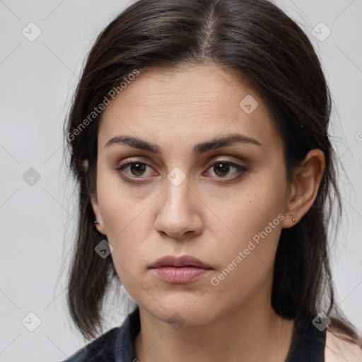 Neutral white young-adult female with medium  brown hair and brown eyes