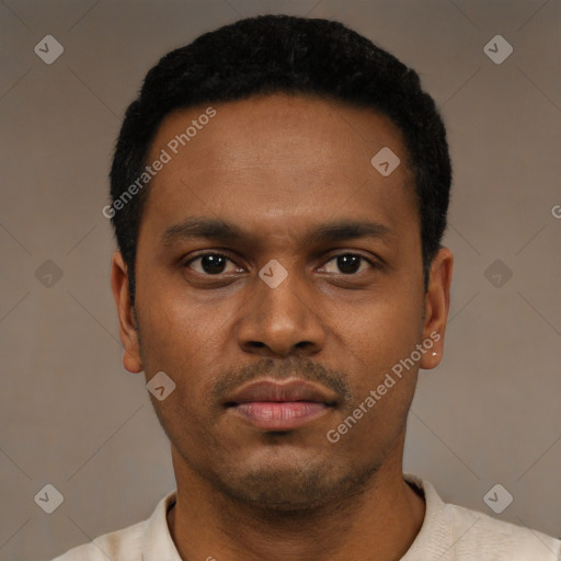 Neutral latino young-adult male with short  black hair and brown eyes