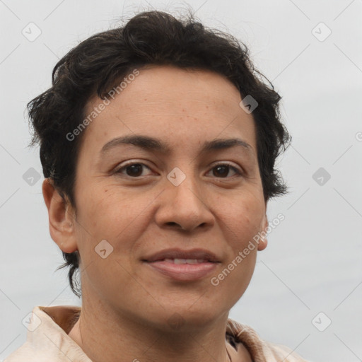 Joyful white adult female with short  brown hair and brown eyes