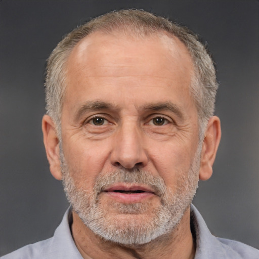 Neutral white middle-aged male with short  gray hair and brown eyes