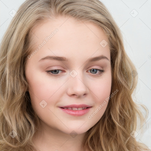 Joyful white young-adult female with long  brown hair and blue eyes