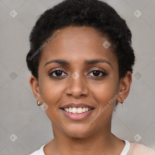 Joyful black young-adult female with short  brown hair and brown eyes