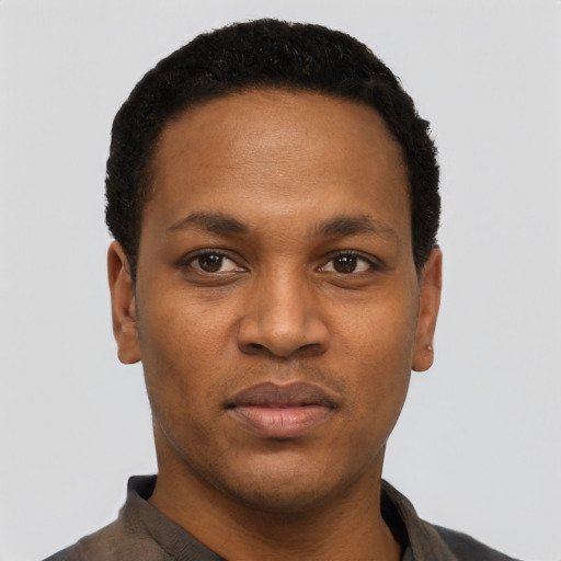 Neutral black young-adult male with short  black hair and brown eyes