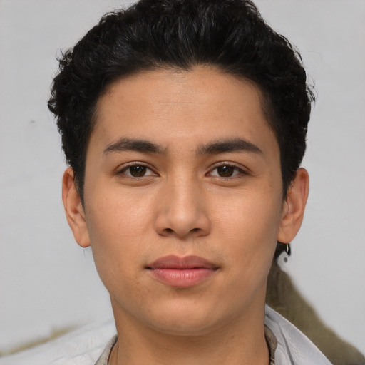 Neutral latino young-adult male with short  brown hair and brown eyes