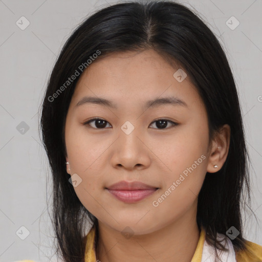 Joyful asian young-adult female with medium  brown hair and brown eyes