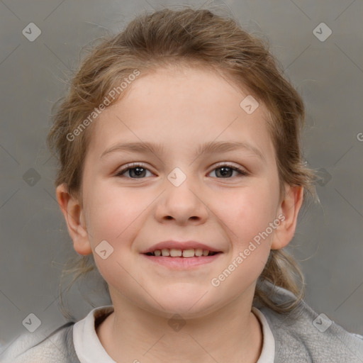 Joyful white child female with medium  brown hair and brown eyes