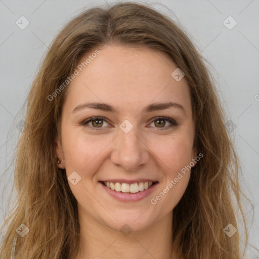 Joyful white young-adult female with long  brown hair and green eyes