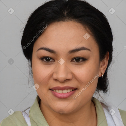 Joyful latino young-adult female with medium  brown hair and brown eyes