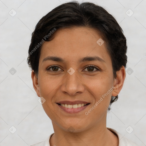 Joyful white young-adult female with short  brown hair and brown eyes