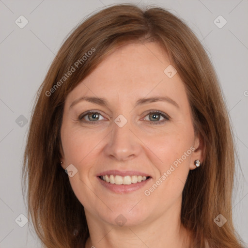 Joyful white adult female with medium  brown hair and brown eyes