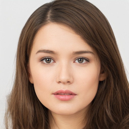 Neutral white young-adult female with long  brown hair and brown eyes