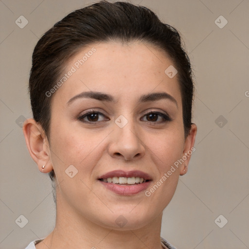 Joyful white young-adult female with short  brown hair and brown eyes