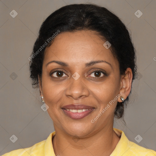 Joyful black adult female with short  brown hair and brown eyes