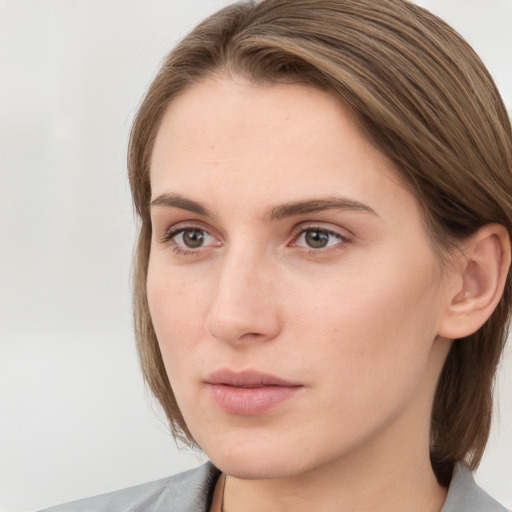 Neutral white young-adult female with medium  brown hair and grey eyes