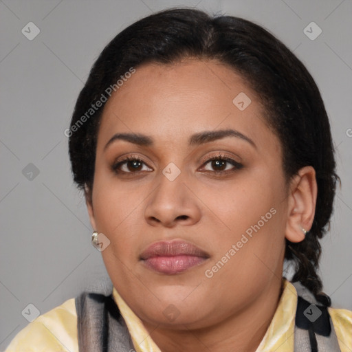 Joyful latino young-adult female with medium  brown hair and brown eyes