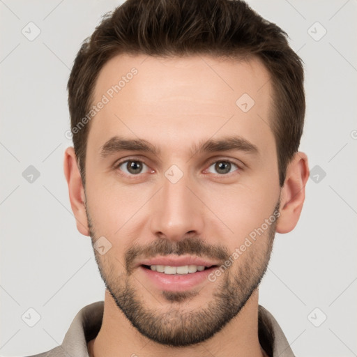 Joyful white young-adult male with short  brown hair and brown eyes