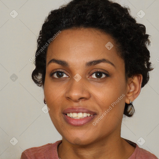 Joyful black young-adult female with medium  black hair and brown eyes