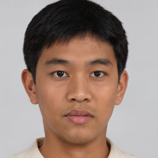 Neutral asian young-adult male with short  brown hair and brown eyes