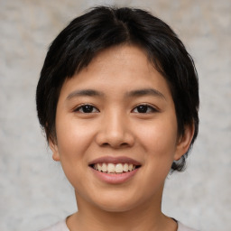 Joyful asian young-adult female with short  black hair and brown eyes