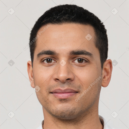 Neutral latino young-adult male with short  black hair and brown eyes