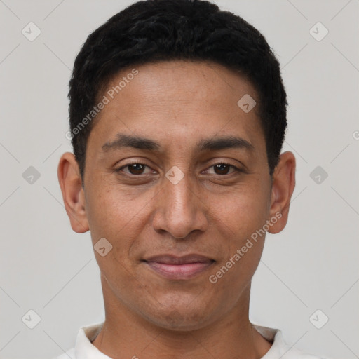 Joyful latino young-adult male with short  black hair and brown eyes