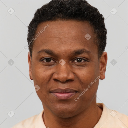 Joyful latino adult male with short  black hair and brown eyes