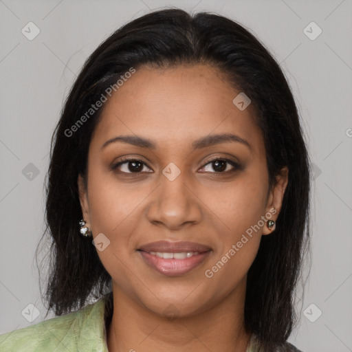 Joyful latino young-adult female with medium  brown hair and brown eyes