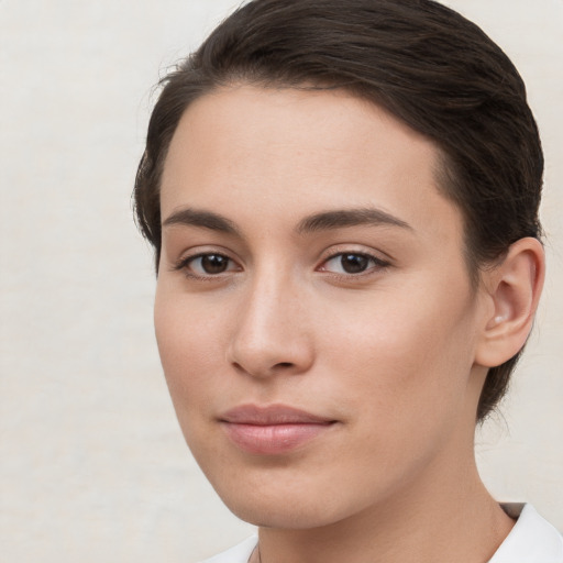 Neutral white young-adult female with medium  brown hair and brown eyes