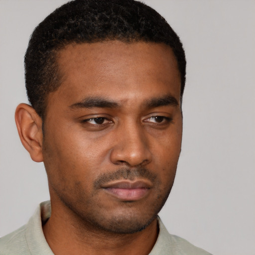 Neutral black young-adult male with short  brown hair and brown eyes