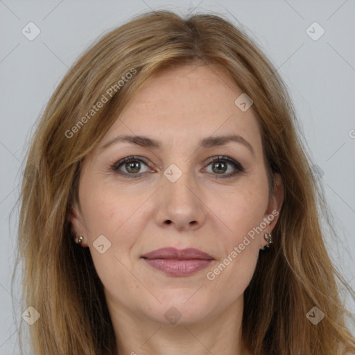 Joyful white adult female with long  brown hair and brown eyes