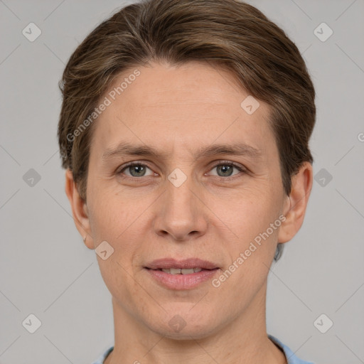 Joyful white adult female with short  brown hair and grey eyes