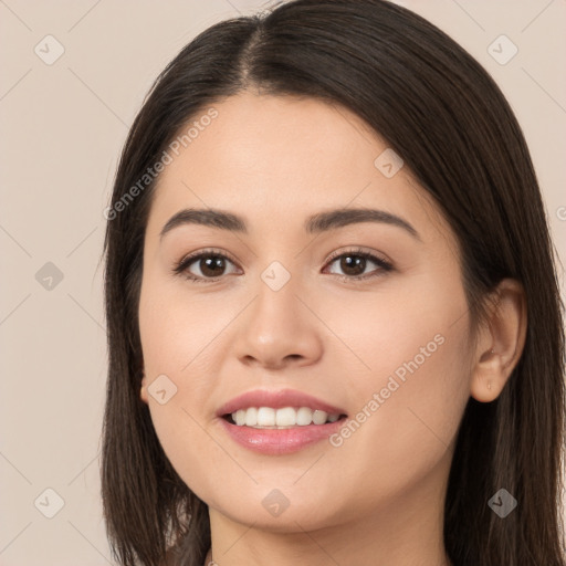 Joyful white young-adult female with long  brown hair and brown eyes