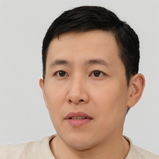 Neutral white young-adult male with short  black hair and brown eyes