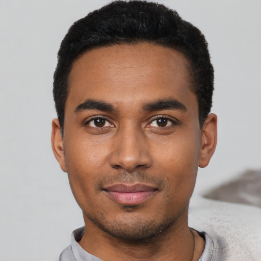 Neutral black young-adult male with short  black hair and brown eyes