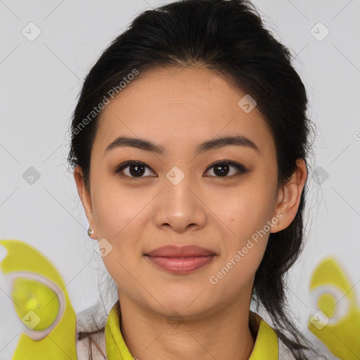 Joyful asian young-adult female with medium  brown hair and brown eyes