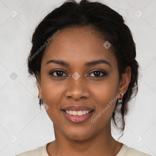 Joyful black young-adult female with long  brown hair and brown eyes