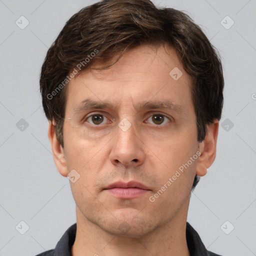 Neutral white adult male with short  brown hair and brown eyes