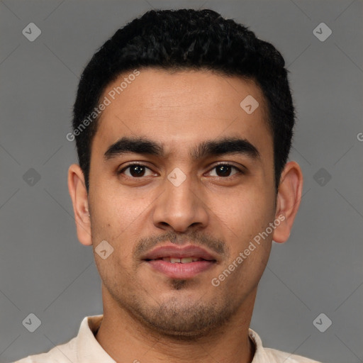 Joyful latino young-adult male with short  black hair and brown eyes