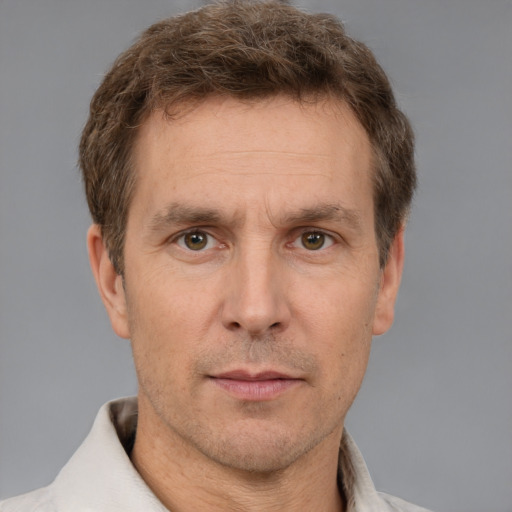 Neutral white adult male with short  brown hair and brown eyes